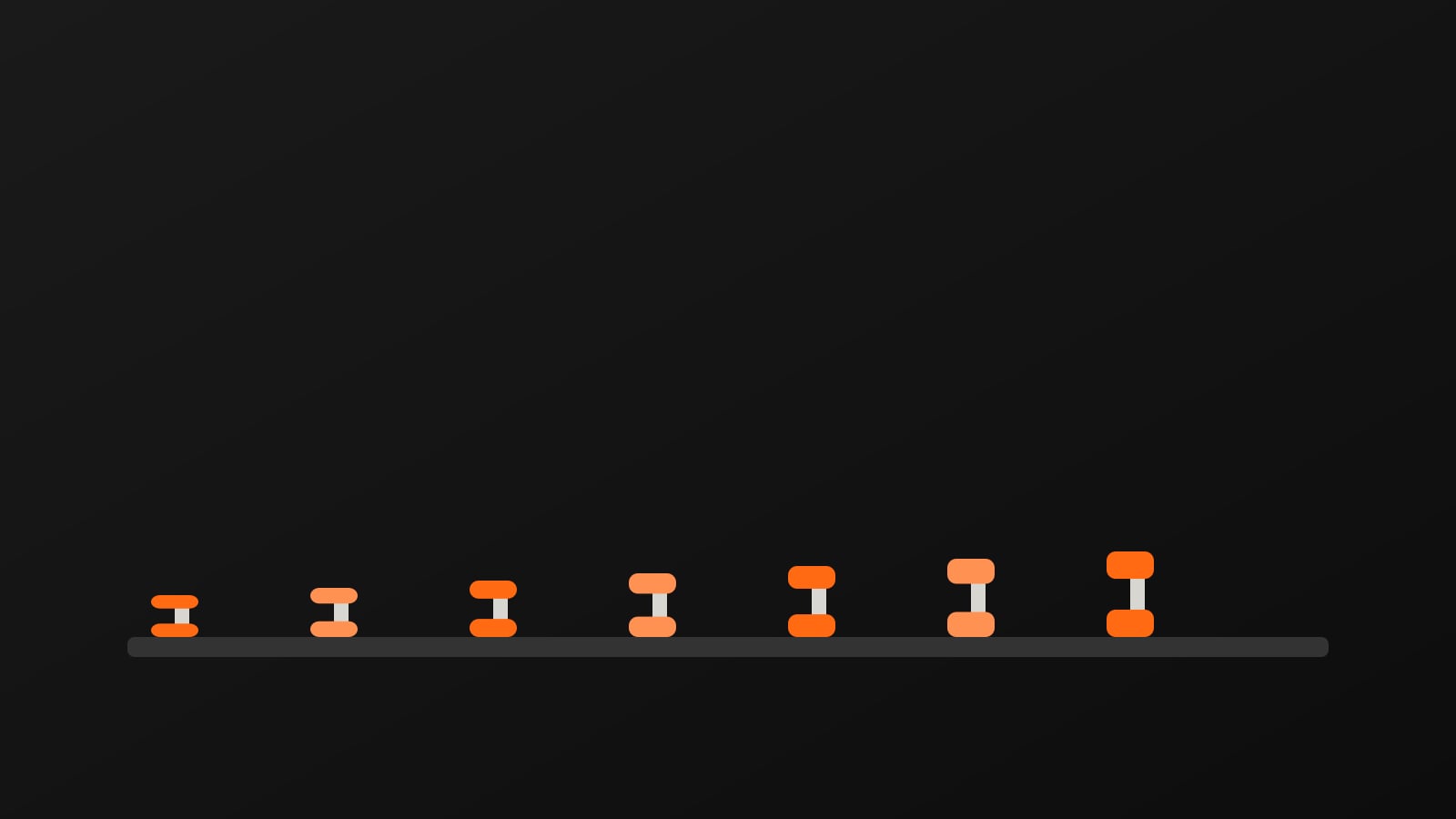 A rack of adjustable dumbbells lined up in a training space